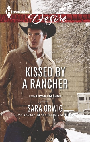 Kissed by a Rancher (Lone Star Legends)