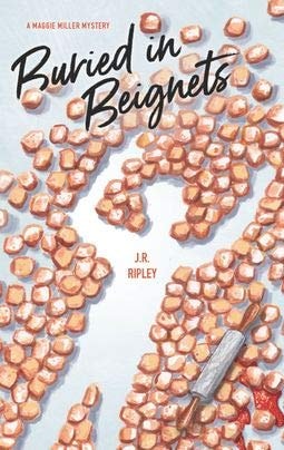Buried in Beignets (A Maggie Miller Mystery)