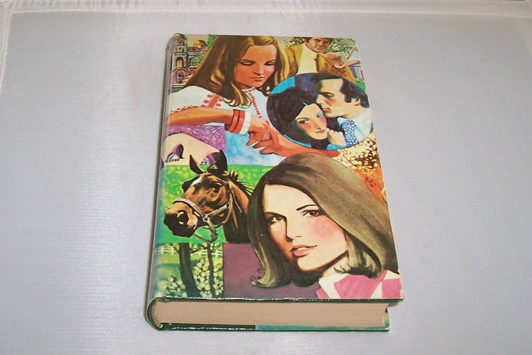 Romance Treasury: The Enchanted Island, Kindled Fire, and Rising Star