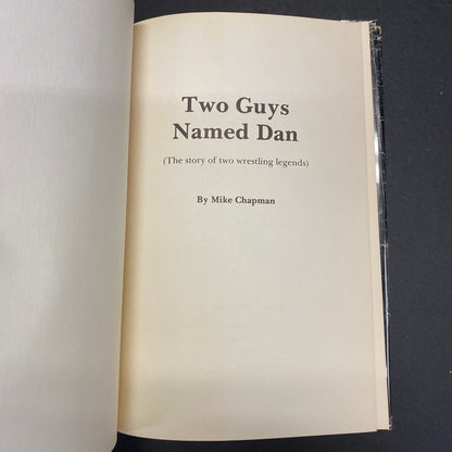 Two Guys Named Dan - Mike Chapman - Signed by Dan Gable -  1976