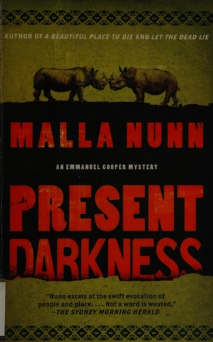 Present Darkness: A Novel (Emmanuel Cooper Mysteries)